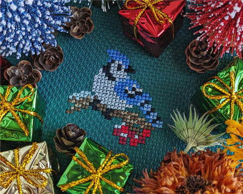 Snowy Blue Jay Christmas Ornament - StitchSprout Cross Stitch